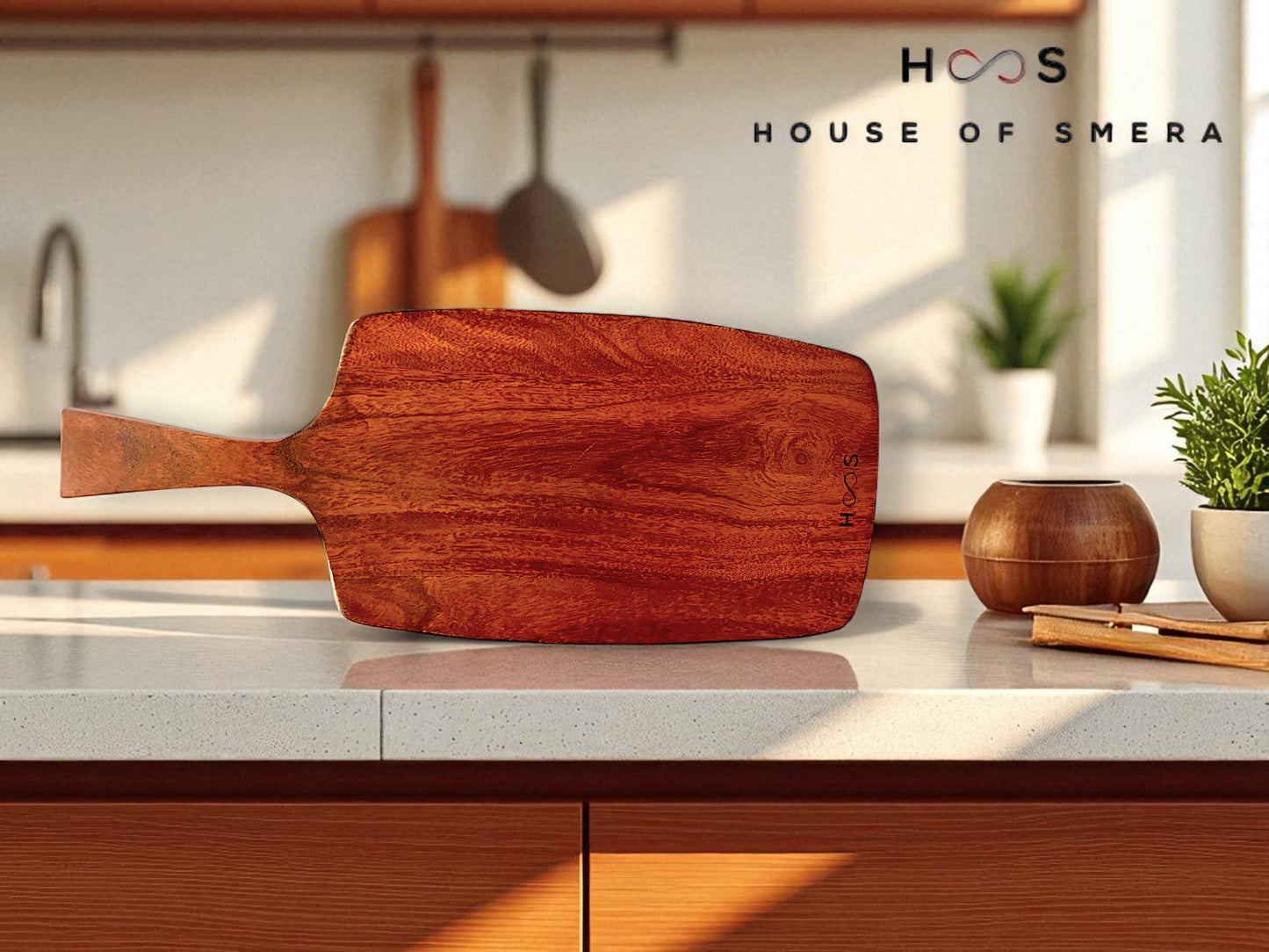 Wooden cutting board on a kitchen counter with 'House of Smera' branding.